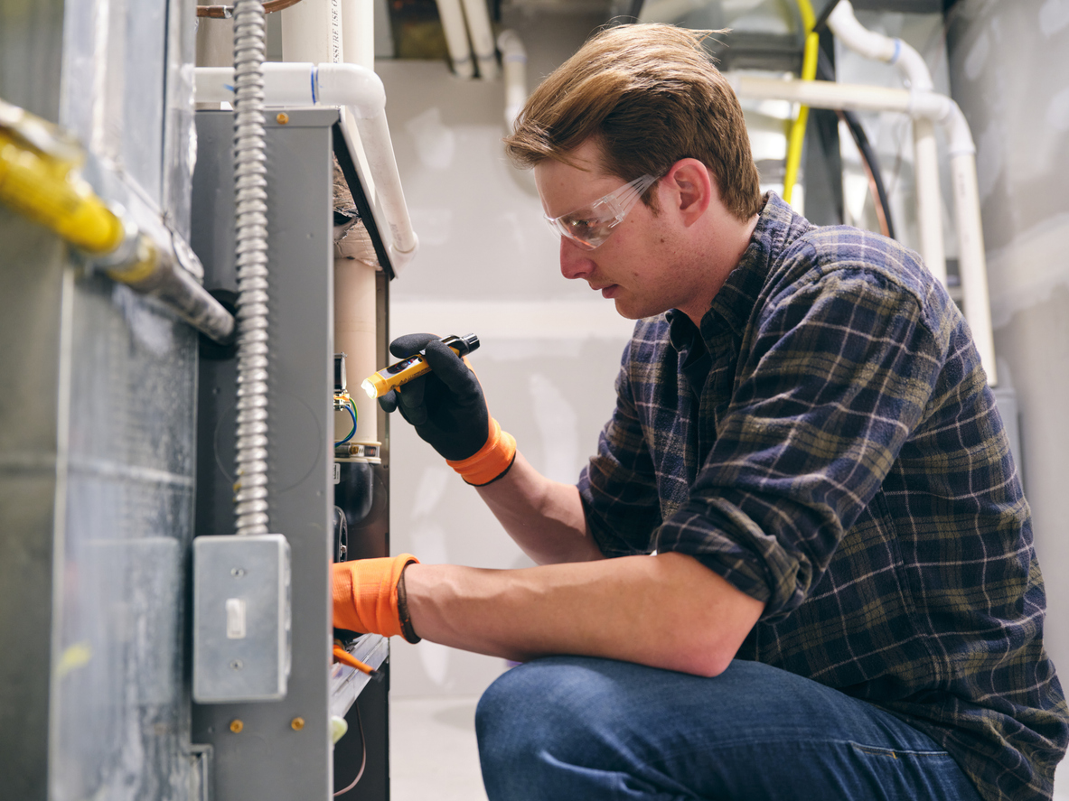 Tech Working on Furnace
